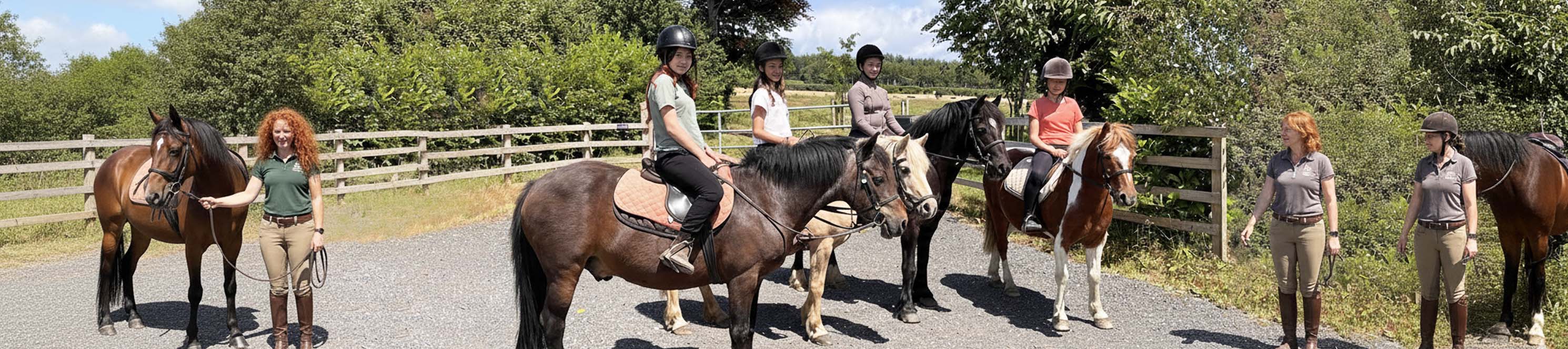 Teenagers horse riding in Ireland