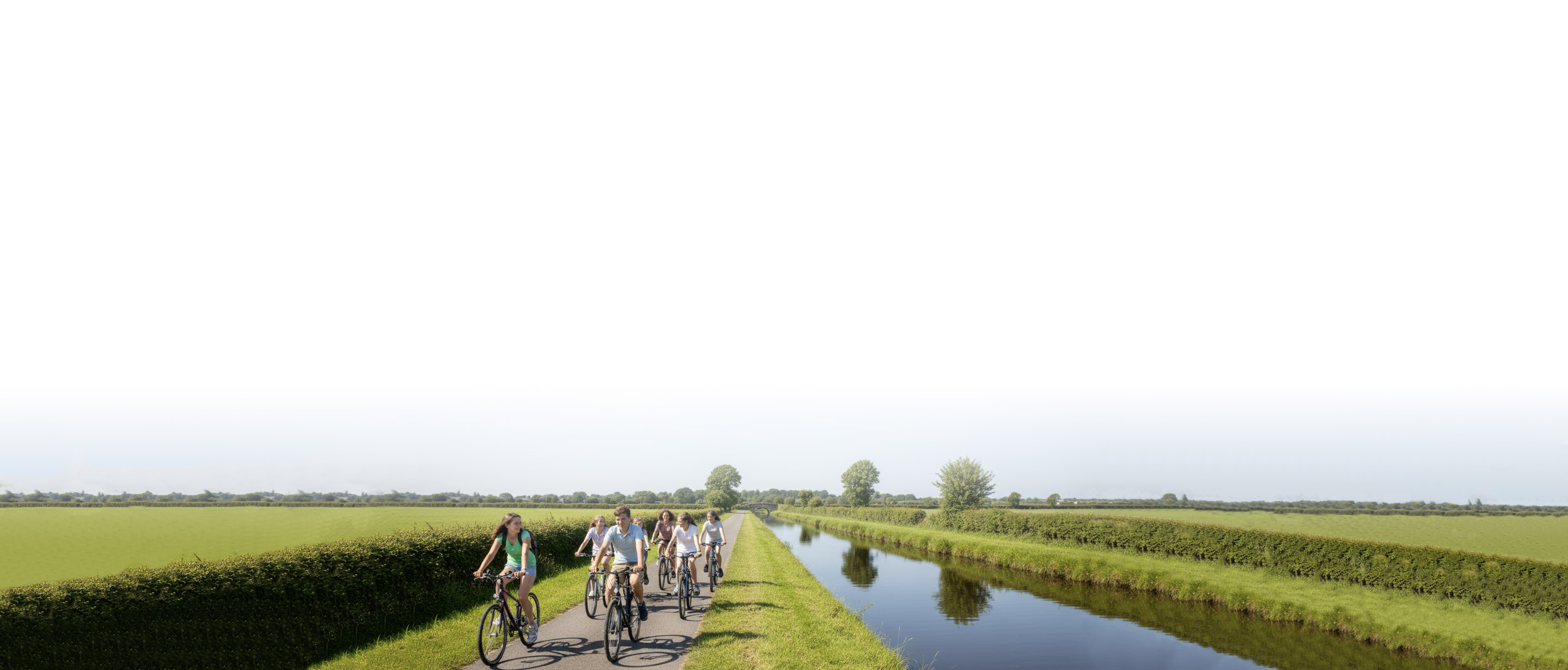 Teenagers cycling beside the Royal Canal during a C2 English immersion in Ireland